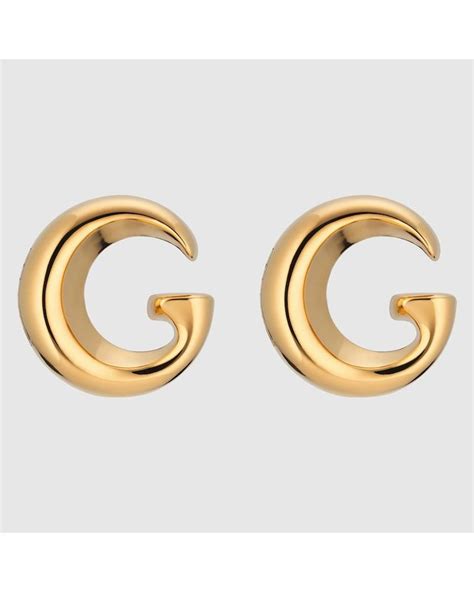 motif gucci|Earrings with G motif in gold.